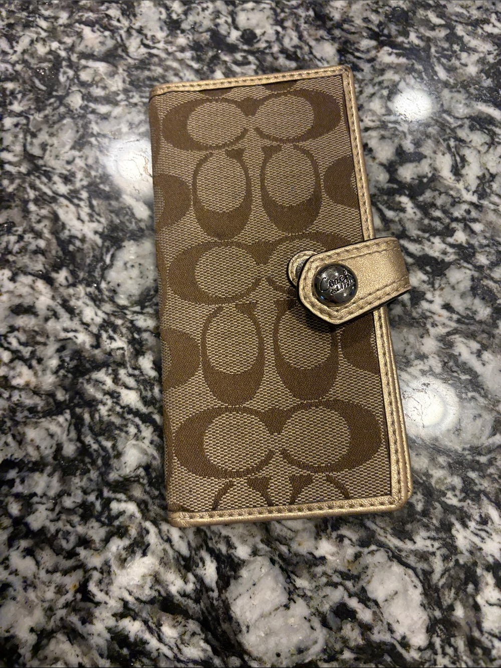Thin gold/tan Coach wallet with snap